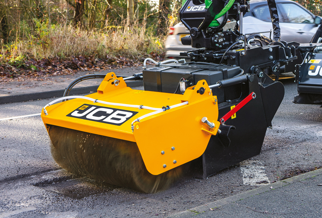 Pothole Pro Wheeled Excavator using sweeper