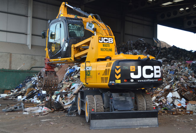 JCB JS145W High Rise Wheeled Excavator working in a waste facility